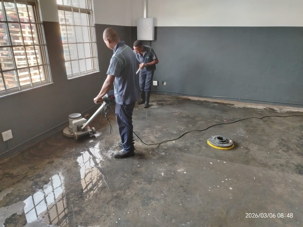 Buffing floors during an office refurbishment clean