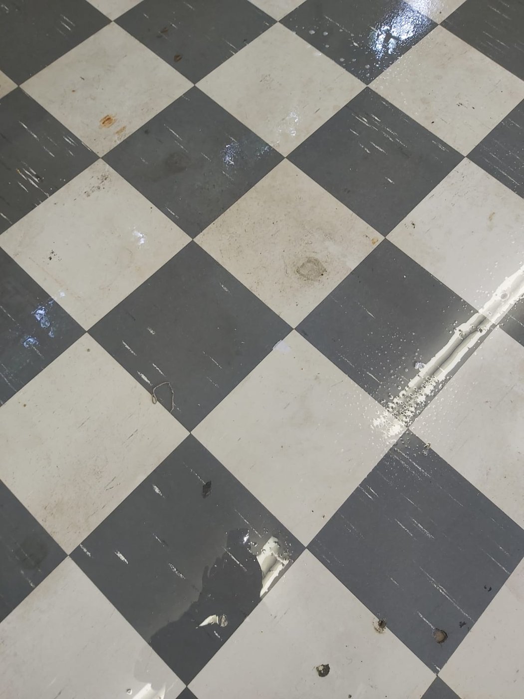 Vinyl checkerboard stripped and re-polished